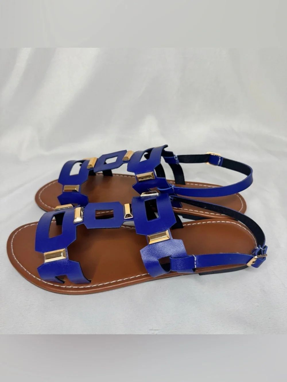 Women’s Blue Strap Sandals with Gold Buckle Accents